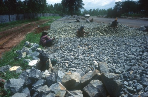 MYANMAR, Taukkyan, People working along the road to Pegu from Taukkyan near Yangon.