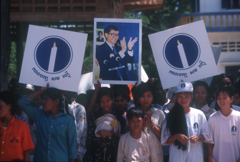 CAMBODIA, Politics, Crowd waving election campaign posters.