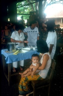 CAMBODIA, Tanko, Woman holding a child waiting to receive ICRC innoculation.