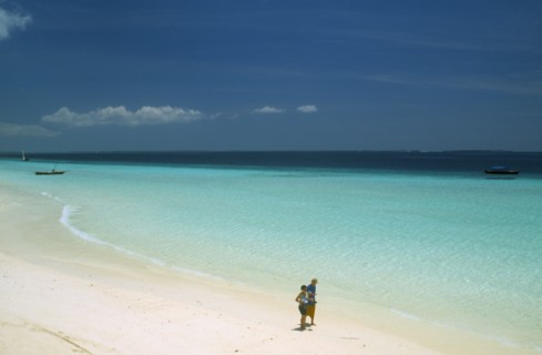 TANZANIA, Zanzibar Island, "Nungwi.  View along beach with white sand and aquamarine sea, towards