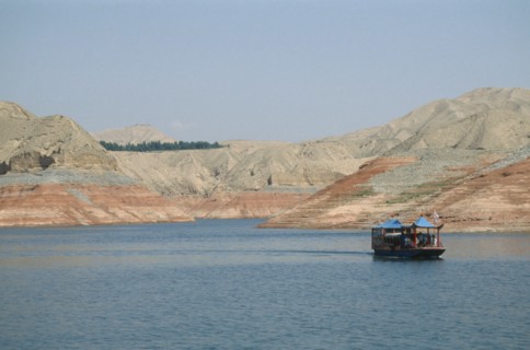 CHINA, Gansu Province, Yellow River, Linjiaxia Reservoir  with ferry