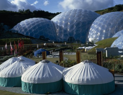 ENGLAND, Cornwall, St. Austell, Eden Project.  General view over the Humid Tropics Biome exterior