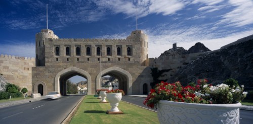 OMAN, Muscat, "Muscat Gate Museum,  Crenellated gatehouse with archways over roads divided by