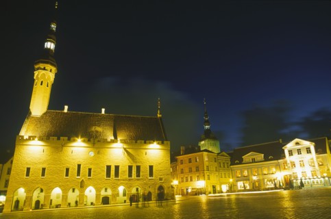 ESTONIA, Tallinn, Raekoja Plats.  Exterior of the town hall and nearby shops and restaurant