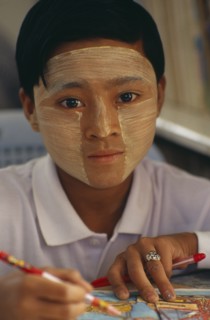 MYANMAR, Children, Single Girls, Young girl wearing thanaka paste on her face in traditional