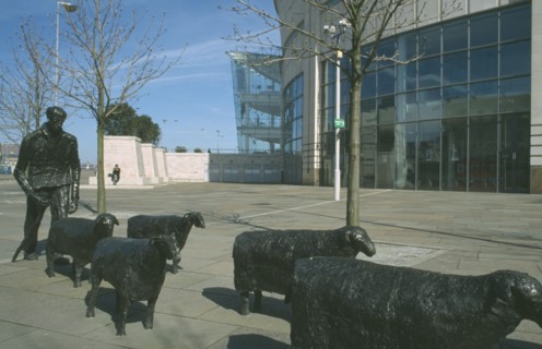 IRELAND, North, Belfast, "Shepherd and Sheep sculpture by artist Deborah Brown, in the grounds of