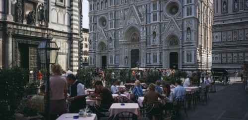 ITALY, Tuscany, Florence, Cafe in front of the Neo-Gothic marble facade of the Duomo with people