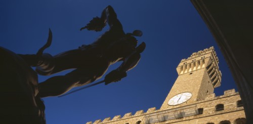 ITALY, Tuscany, Florence, Piazza della Signoria.  Angled view of statue of Perseus with the head of