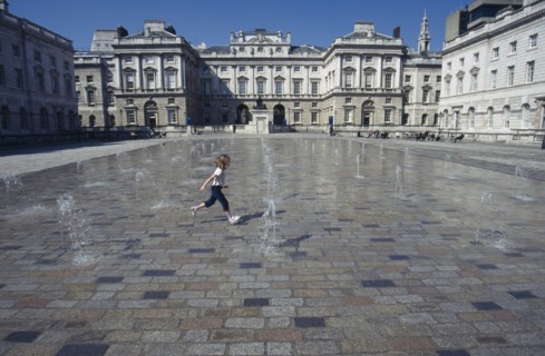 ENGLAND, London, Somerset House and courtyard with rows of small fountains spouting from the ground