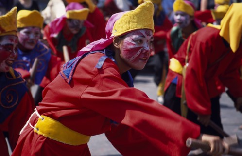 THAILAND, North, Chiang Mai, An accompanying performer in the Dragon dance at the end of Chinese