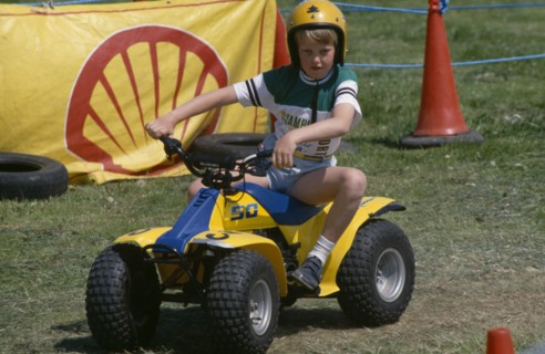 20020463 SPORT Motorbikes Children Young boy on quad bike