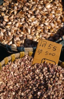THAILAND, North, Chiang Mai, Wholesale Food Market.  Garlic cloves for sale displayed in woven
