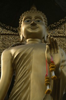 THAILAND, North, Chiang Mai, Wat Bupparam Temple on Tha Phae Road. View looking upwards at face of
