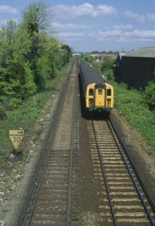 TRANSPORT, Rail, Train, Railway tracks with approaching train.