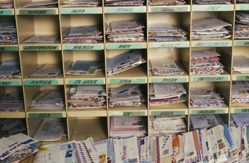 AUSTRALIA, New South Wales, Sydney, Dead letter office at Australia Post with airmail post sorted