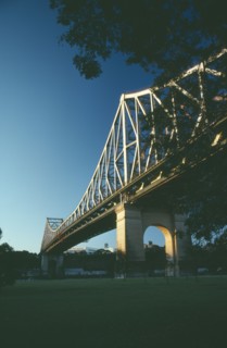 AUSTRALIA, Queensland, Brisbane, Angled view of Storey Bridge at sunset.
