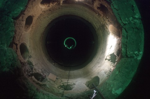 CUBA, Havana Province, Mariel, Inside a tunnel under construction with workers in the distance in a