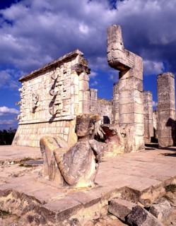 MEXICO, Yucatan, Chichen Itza, Reclining figure in foreground