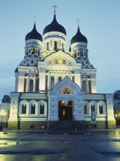 ESTONIA, Tallinn, Alexander Nevsky Cathedral facade illuminated at dusk.
