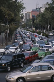 MEXICO, Mexico City, "Traffic congestion on Paseo de La Reforma, long tailback of cars and taxis."