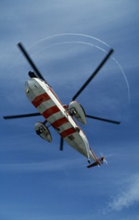 SCOTLAND, North Sea, Murchison Oil Field, "Helicopter hovering, seen from below with red and white