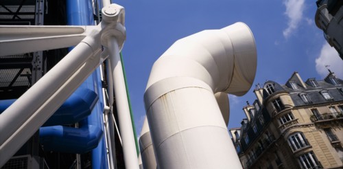 FRANCE, Ile de France, Paris, "Pompidou Centre.  Part view of industrial style exterior with older,