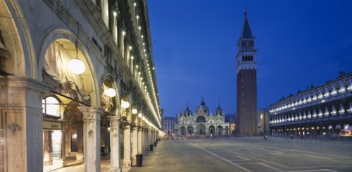 ITALY, Veneto, Venice, Piazza San Marco.  View along the colonnaded Procuratie Vecchie towards the