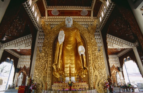 MALAYSIA, Penang, Georgetown, Dharmikarama Burmese Temple.  Interior with large standing Buddha