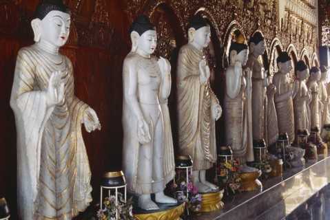 MALAYSIA, Penang, Georgetown, Dharmikarama Burmese Temple.  Interior with large standing Buddha