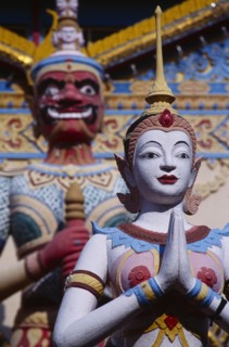 MALAYSIA, Penang, Georgetown, "Wat Chayamangkalaram.  Exterior, temple statues."