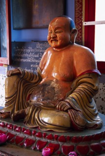 MALAYSIA, Penang, Georgetown, Wat Chayamangkalaram.  Interior with laughing Buddha figure.