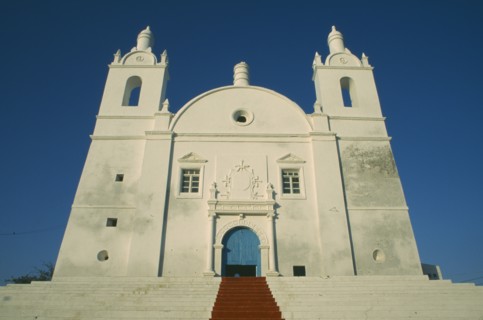INDIA, Gujarat, Diu, Church of St Thomas.  Exterior view looking up steps toward facade with