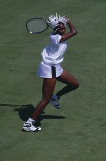 10128798 SPORT  Ball Games Tennis  Venus Williams on court taking shot.