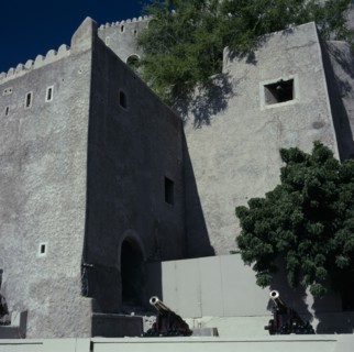 OMAN, Capital Area, Muscat, "Fort Mirani. Crenellated walls, brass canon and balls."