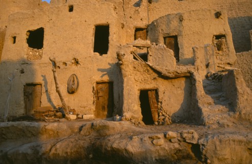 EGYPT, Western Desert, Siwa Oasis, Shali Fortress detail of old mud houses at sunrise