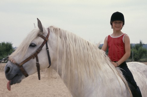 20002709 SPORT Equestrian Horse Riding Young girl on pony