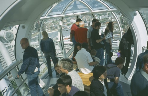 ENGLAND, London, British Airways London Eye Milennium wheel interior of capsule with tourists