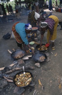 NIGERIA, Abuja, Cooking food at Dikko market