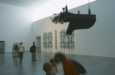 ENGLAND, London, Tate Modern. Modern art exhibition room with piano suspended from the ceiling and