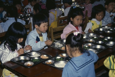 SOUTH KOREA, Mokpo, Nursery school pupils eating lunch.