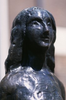 HOLLAND, Noord, Amsterdam, Westermarkt. Statue of Anne Frank the young diary writer during the Nazi