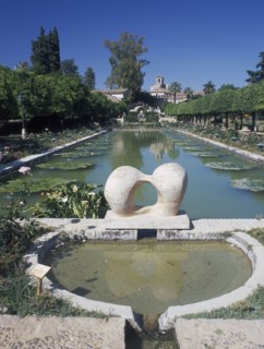 SPAIN, Andalucia, Cordoba, Alcazar de los Reyes Cristianos and its gardens with large pond and