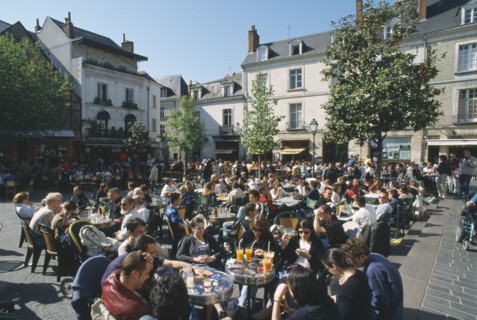FRANCE, Loire Valley, Indre et loire, Tours Place Plumereau with view over people eating at tables