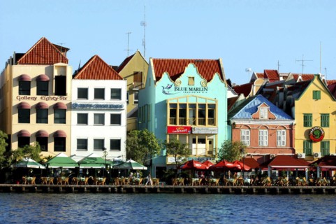 WEST INDIES, Dutch Antilles, Curacao, Old Willemstad. Row of brightly painted waterfront