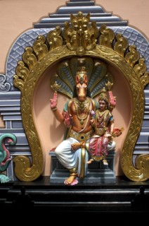 SINGAPORE, Central, Chinatown, Sri Mariamman Temple. Detail of brightly coloured Hindu carvings