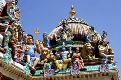 SINGAPORE, Central, Chinatown, Sri Mariamman Temple. Detail of brightly coloured Hindu carvings
