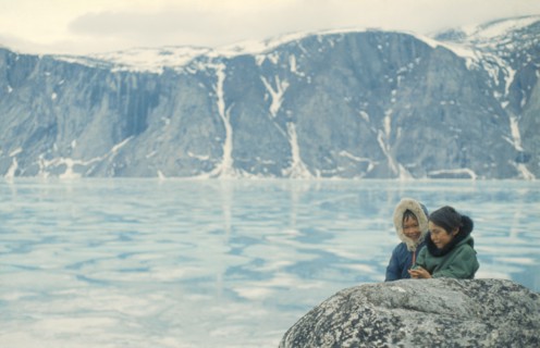CANADA, Nunavut, Baffin Island, Inuit children in glacial landscape.
