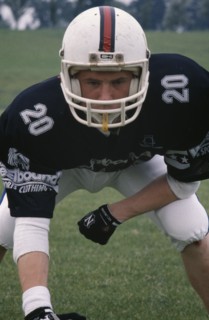 SPORT, Ball Games, American Football, British American footballer wearing body protector and helmet