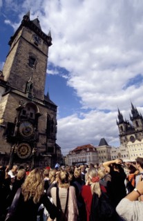 CZECH REPUBLIC, Prague, Astronomical Clock on the wall of the Town Hall with Tyn Church beyond