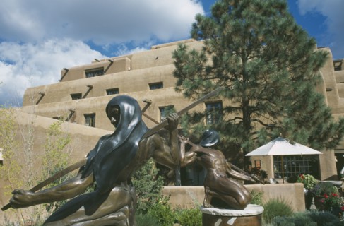 USA, New Mexico, Santa Fe, Sculptures outside hotel entrance